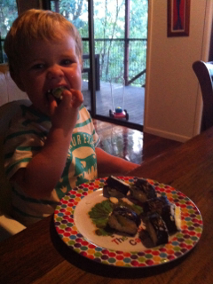 toddler eating sushi